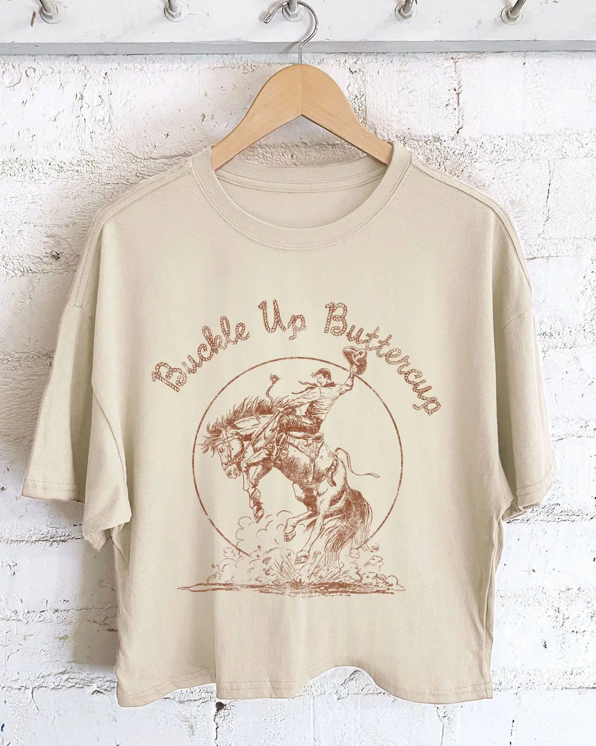 Buckle Up Buttercup Cowboy Long-Crop Tee (Khaki) 1
